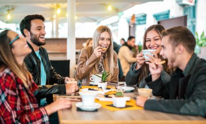 A group of students having coffee and talking