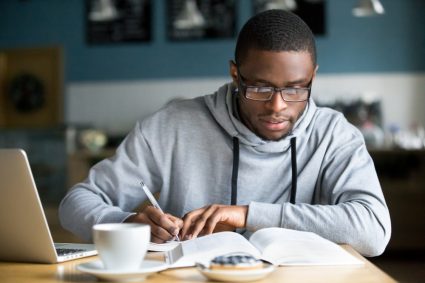 A young man studying